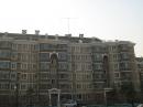 BA1KW`s rooftop antenna farm: a Create Design 318 tribander, a 40m vertical and a random wire for 80 and 160.